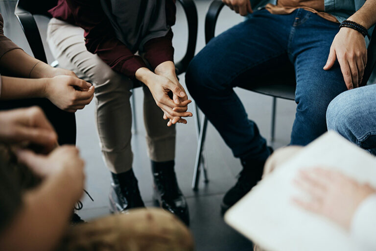 People participate in a Celebrate Recovery 12 Step meeting.