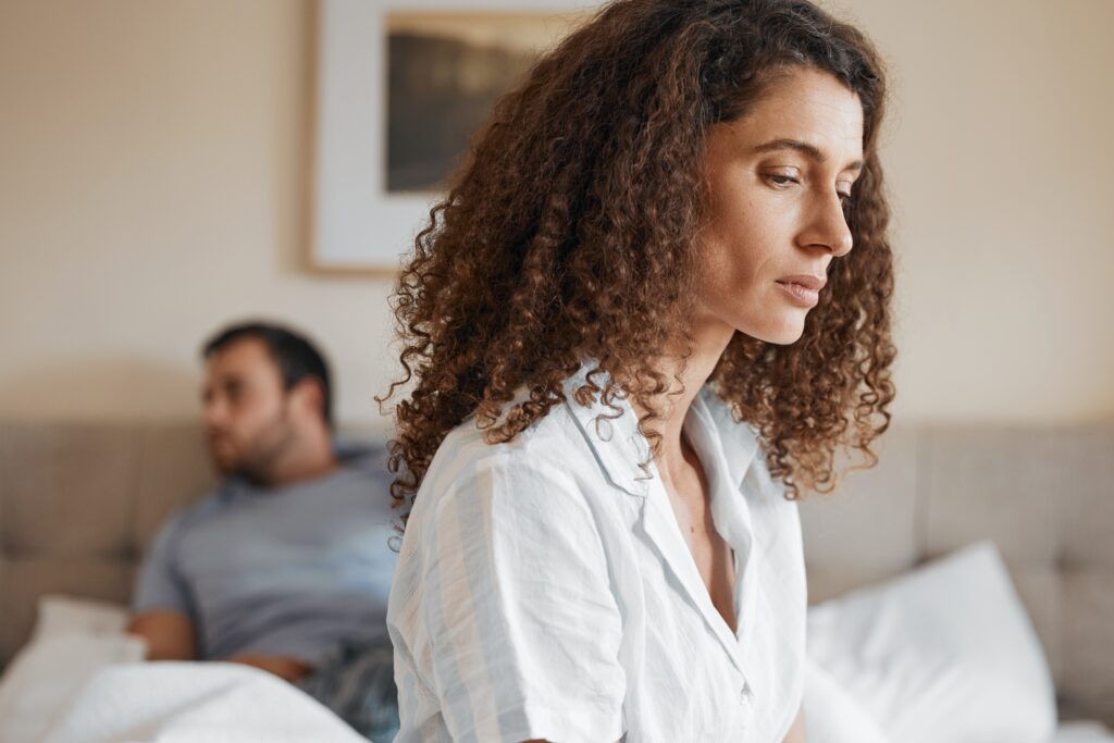 A woman experiences relationship problems, one of the signs of prescription drug abuse.