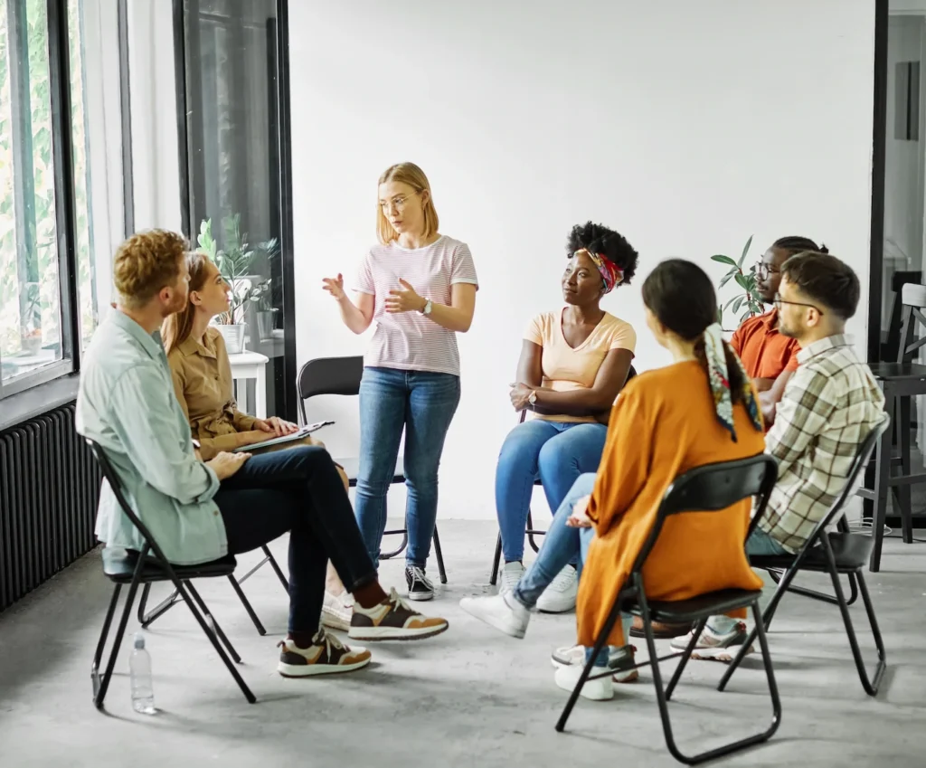 People participate in group therapy.