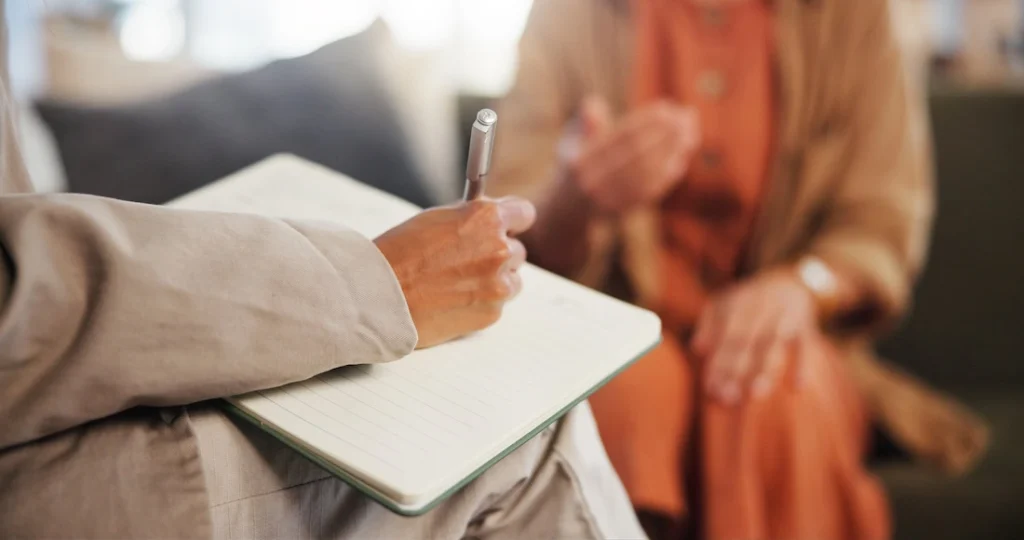 A person meets with an ADHD therapist.