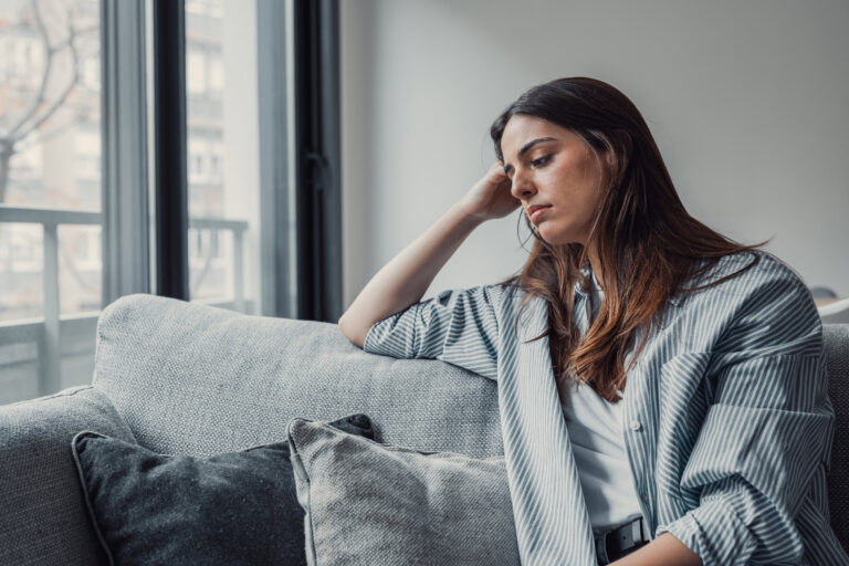 Depressed woman asking herself is depression a disability?