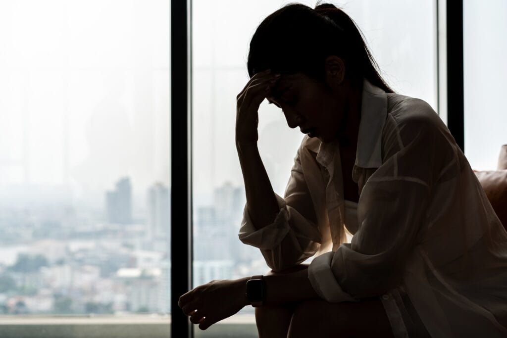 Depressed woman wondering Does Depression Cause Memory Loss?